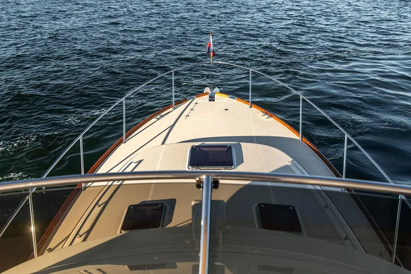 Paddy Wagon Yacht Photos Pics 2017 Hinckley Talaria 43 Flybridge cruising on open water, view from the flybridge.