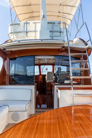 Paddy Wagon Yacht Photos Pics 2017 Hinckley Talaria 43 Flybridge yacht with elegant wood finish and spacious seating.