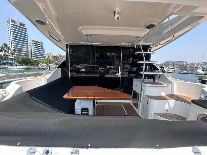 Here & Now 2017 Sea Ray 510 Fly @ Acapulco Yacht Photos Pics 2017 Sea Ray Fly 510 yacht with outdoor seating and marina view.