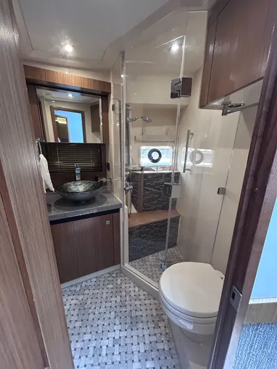 Here & Now 2017 Sea Ray 510 Fly @ Acapulco Yacht Photos Pics 2017 Sea Ray Fly 510 yacht bathroom with modern fixtures and glass shower.