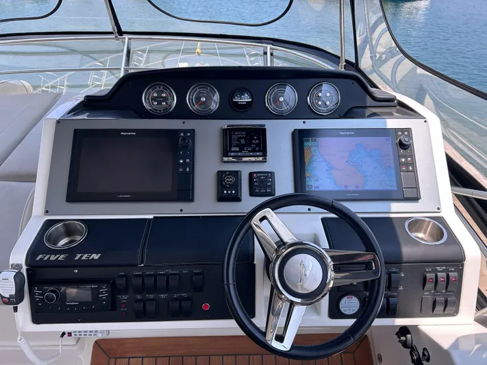 Here & Now 2017 Sea Ray 510 Fly @ Acapulco Yacht Photos Pics 2017 Sea Ray Fly 510 helm with navigation screens and controls.