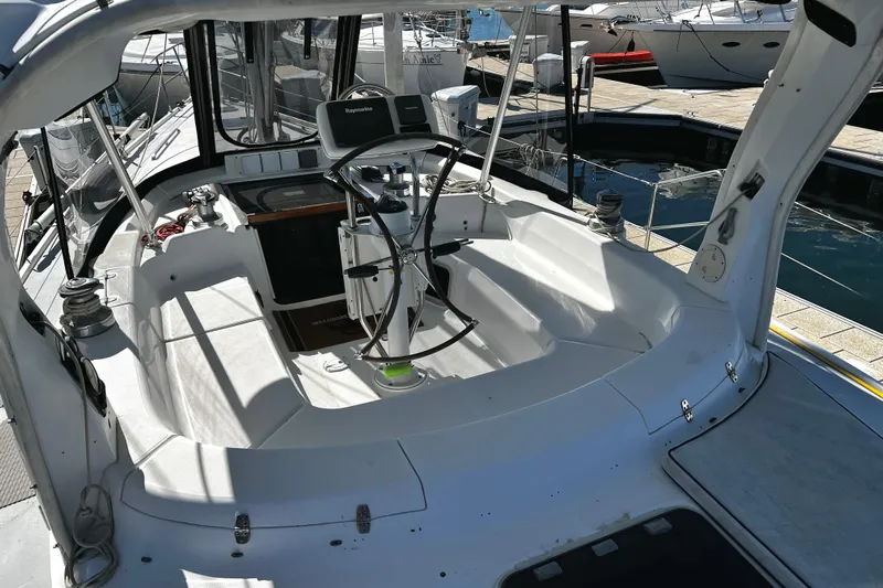  Yacht Photos Pics Cockpit of 1999 Hunter Passage 420 sailboat docked at marina.