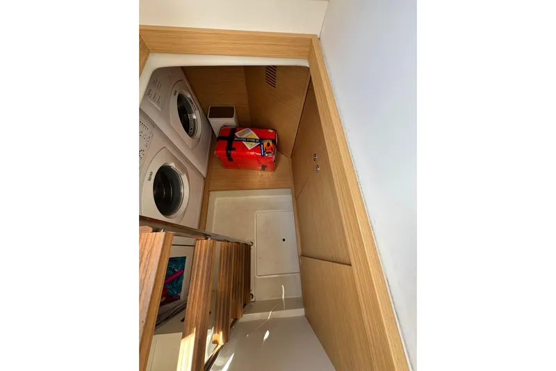  Yacht Photos Pics Laundry area in 2020 Pardo Yachts 50, featuring washer and dryer.