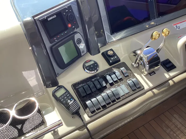  Yacht Photos Pics Control panel of a 2006 Sea Ray 48 Sundancer yacht with navigation equipment.