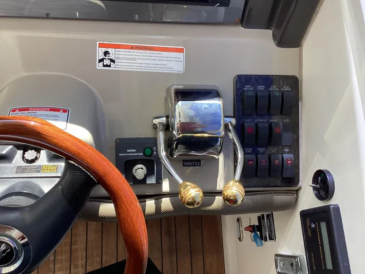  Yacht Photos Pics Control panel of a 2006 Sea Ray 48 Sundancer yacht with throttle and switches.