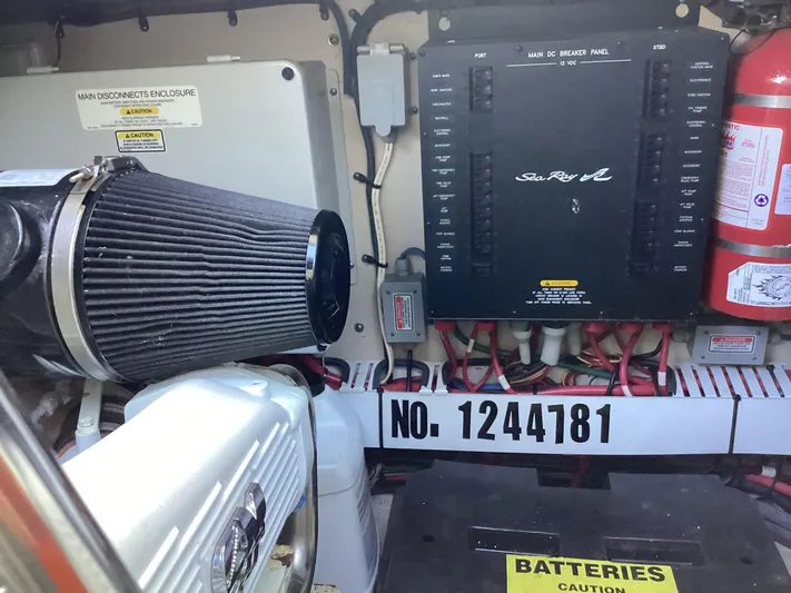  Yacht Photos Pics Engine room of 2006 Sea Ray 48 Sundancer with electrical panel and fire extinguisher.