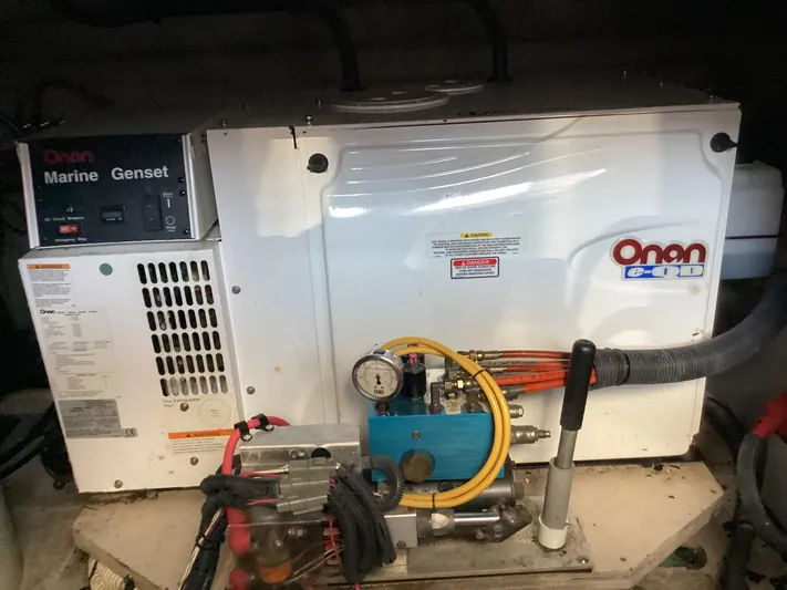  Yacht Photos Pics Onan marine generator in a 2006 Sea Ray 48 Sundancer yacht engine room.