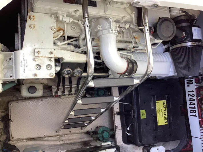  Yacht Photos Pics Engine compartment of a 2006 Sea Ray 48 Sundancer with visible components and battery box.