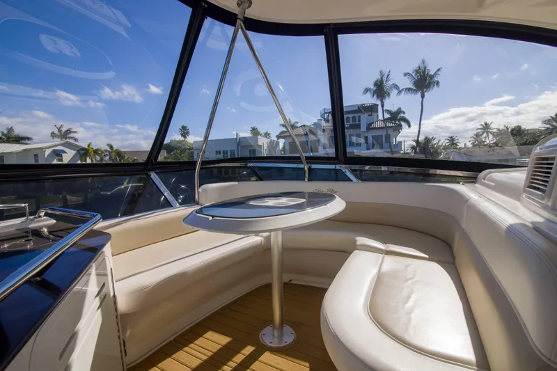 Exodus Yacht Photos Pics Luxurious interior of 2013 Sea Ray 520 Sedan Bridge yacht with panoramic windows.