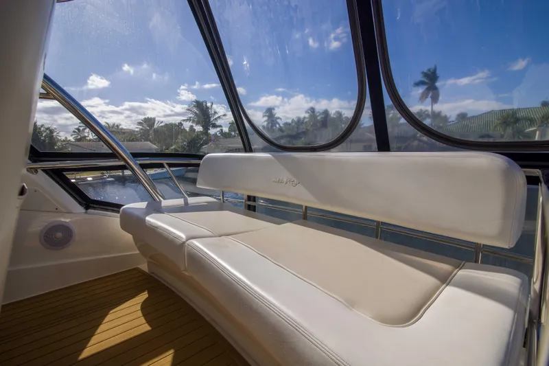 Exodus Yacht Photos Pics Luxurious interior of 2013 Sea Ray 520 Sedan Bridge yacht with scenic view.
