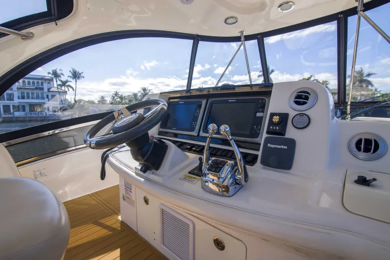 Exodus Yacht Photos Pics Helm of 2013 Sea Ray 520 Sedan Bridge with modern navigation equipment.