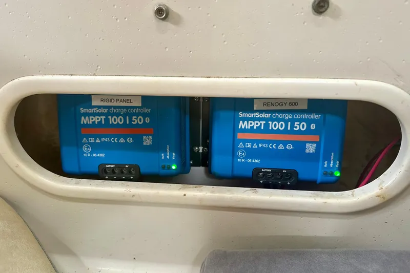 Makai Yacht Photos Pics MPPT charge controllers in a 1999 Catalina 320 boat, enhancing solar power efficiency.