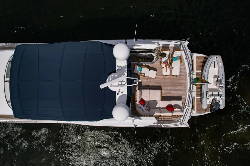 El Tio Yacht Photos Pics Aerial view of 2006 Sunseeker 90 Yacht with deck seating and sunshade.