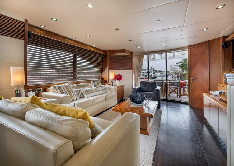 El Tio Yacht Photos Pics Luxurious interior of 2006 Sunseeker 90 Yacht with elegant seating and modern decor.