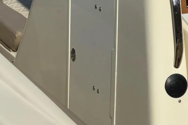  Yacht Photos Pics 2019 Chris-Craft Catalina 30 boat interior with beige seating and sleek design.