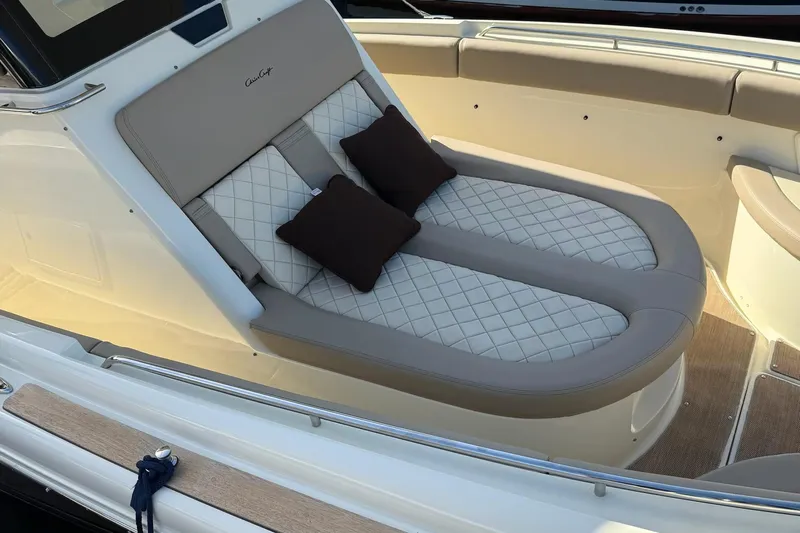  Yacht Photos Pics Luxurious seating on 2019 Chris-Craft Catalina 30 boat with quilted cushions and pillows.