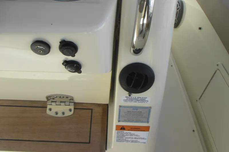  Yacht Photos Pics 2019 Chris-Craft Catalina 30 dashboard with controls and certification labels.