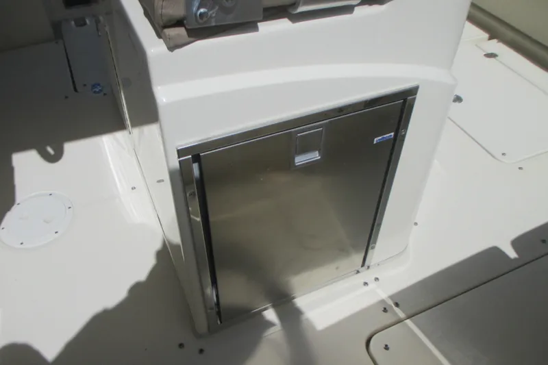  Yacht Photos Pics 2019 Chris-Craft Catalina 30 boat interior with stainless steel storage compartment.