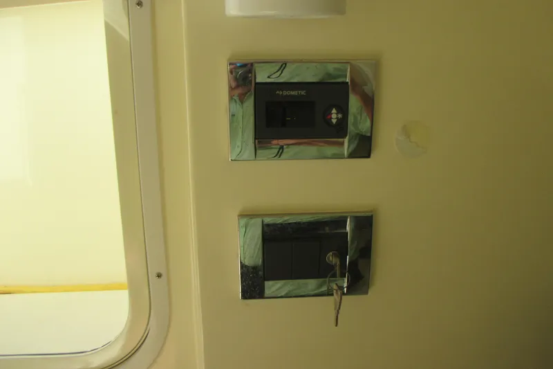  Yacht Photos Pics Control panel inside 2019 Chris-Craft Catalina 30 boat, featuring Dometic system.