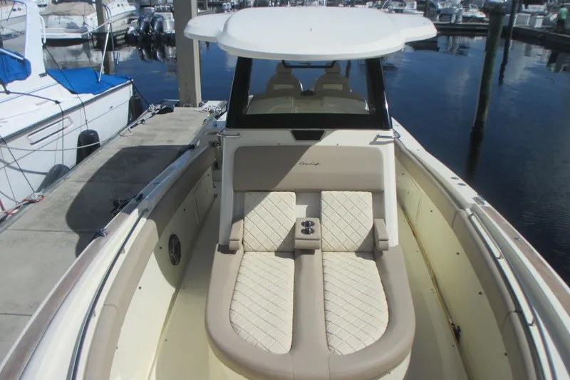  Yacht Photos Pics 2019 Chris-Craft Catalina 30 boat with elegant seating at a marina.