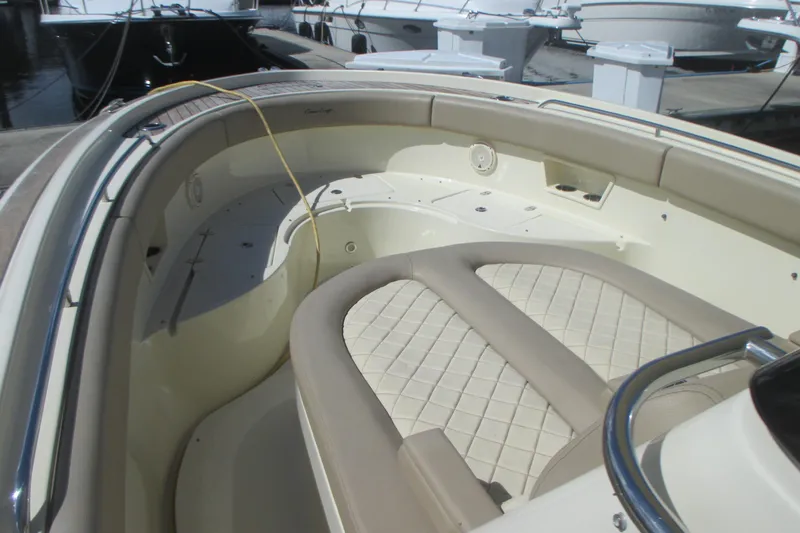  Yacht Photos Pics 2019 Chris-Craft Catalina 30 boat interior with beige seating and deck details.