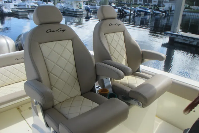  Yacht Photos Pics Luxurious seating on 2019 Chris-Craft Catalina 30 boat, featuring elegant design and comfort.