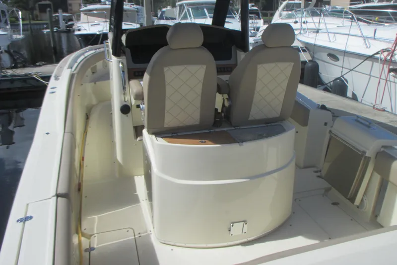  Yacht Photos Pics 2019 Chris-Craft Catalina 30 boat interior with dual seats and helm station.