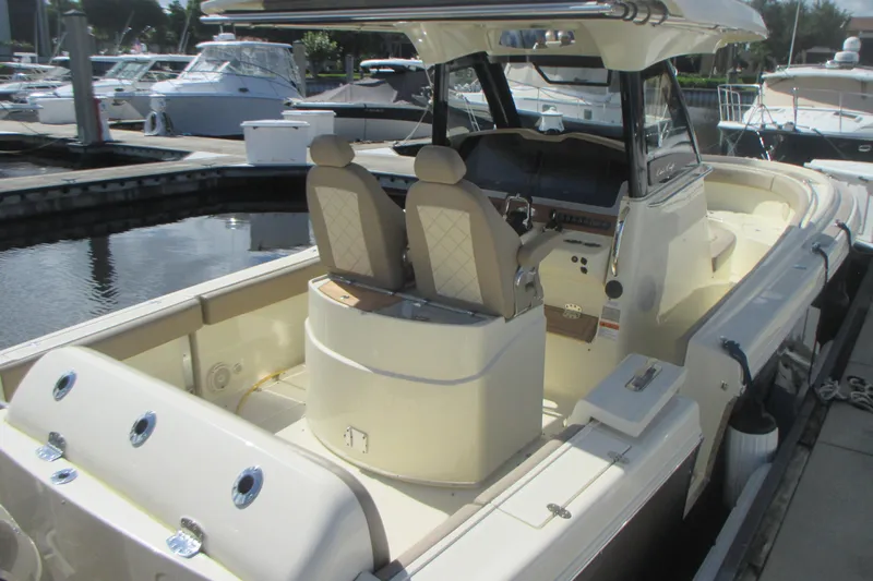  Yacht Photos Pics 2019 Chris-Craft Catalina 30 boat docked, featuring dual seats and sleek design.