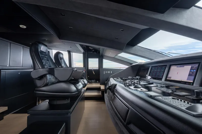 Goldeneye Yacht Photos Pics Luxurious 2020 Mangusta 54 Gransport yacht cockpit with advanced navigation controls.