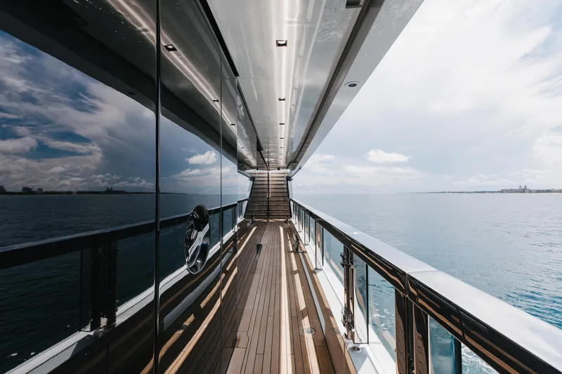 Goldeneye Yacht Photos Pics Luxurious 2020 Mangusta 54 Gransport yacht deck with ocean view and sleek design.