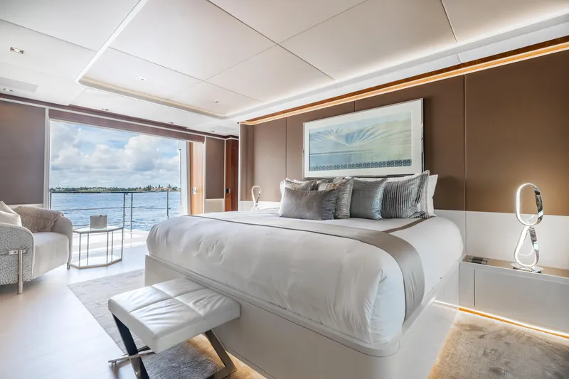 Goldeneye Yacht Photos Pics Luxurious bedroom on 2020 Mangusta 54 Gransport yacht with ocean view.