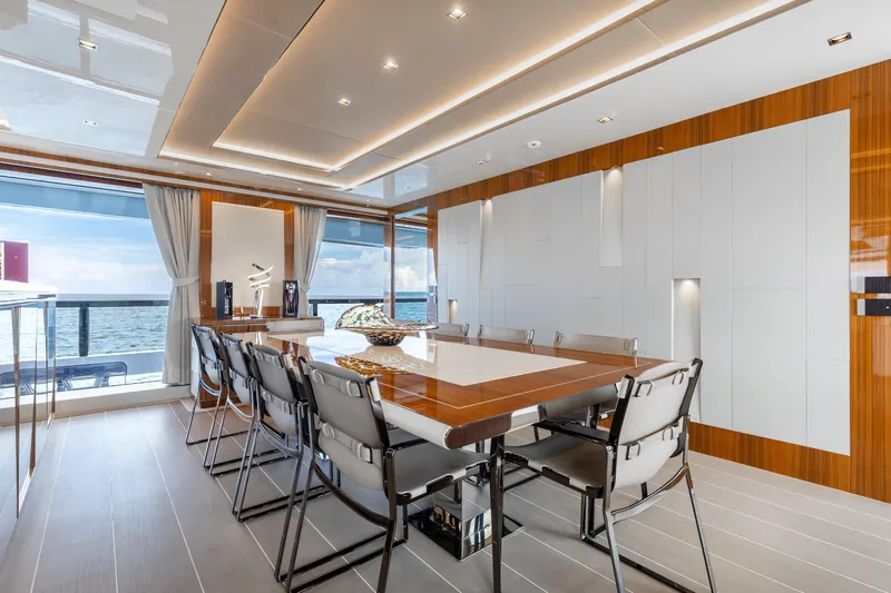 Goldeneye Yacht Photos Pics Luxurious dining area on 2020 Mangusta 54 Gransport yacht with ocean view.