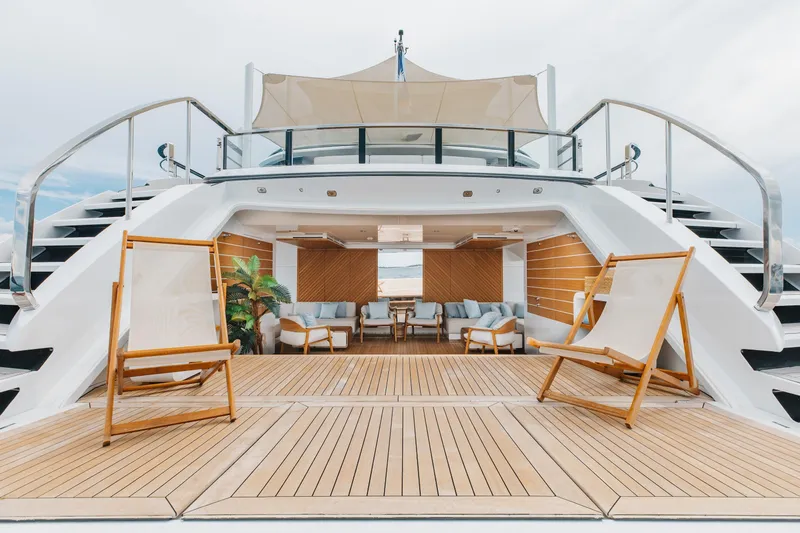 Goldeneye Yacht Photos Pics Luxurious 2020 Mangusta 54 Gransport yacht deck with elegant seating and modern design.