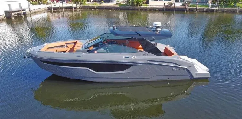  Yacht Photos Pics 2023 Cruisers Yachts 38 GLS luxury boat on calm water.