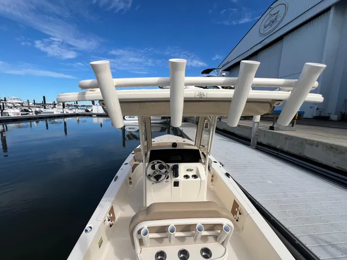  Yacht Photos Pics 2025 Scout 231 XSB boat docked at marina, clear blue sky, modern design.