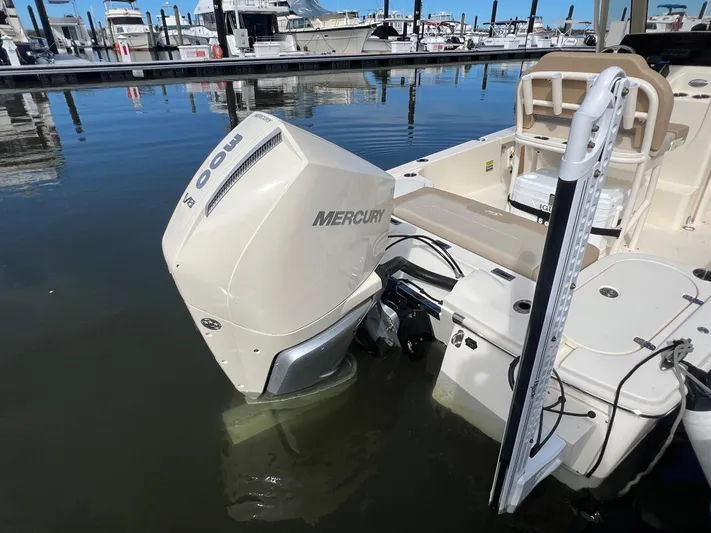  Yacht Photos Pics 2025 Scout 231 XSB boat with Mercury 300 V8 engine at marina.