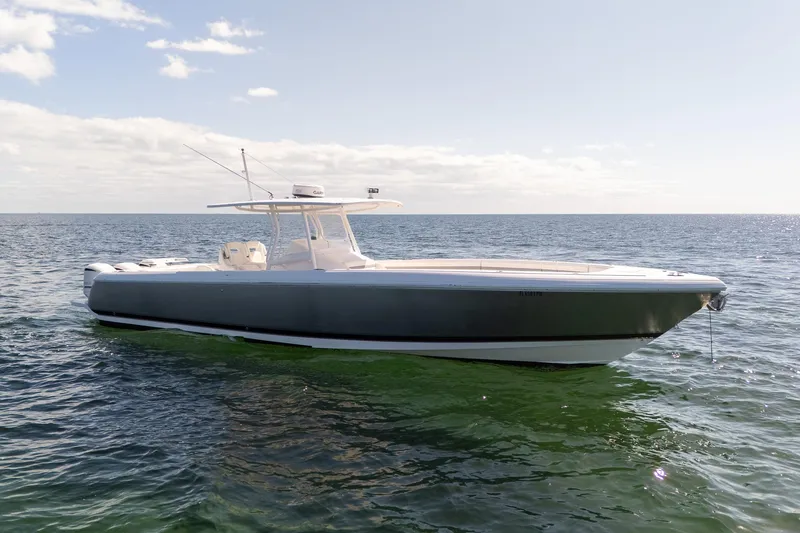  Yacht Photos Pics 2015 Intrepid 400 Center Console boat on calm ocean waters under clear sky.