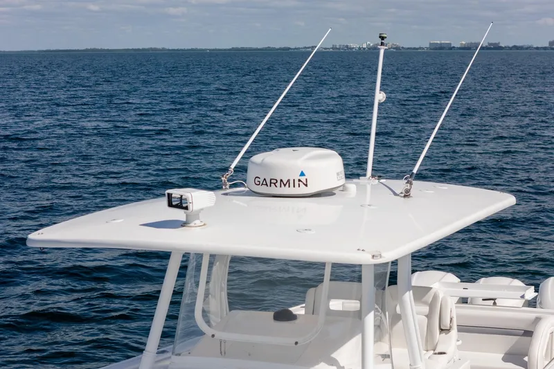  Yacht Photos Pics 2015 Intrepid 400 Center Console with Garmin radar on open sea.