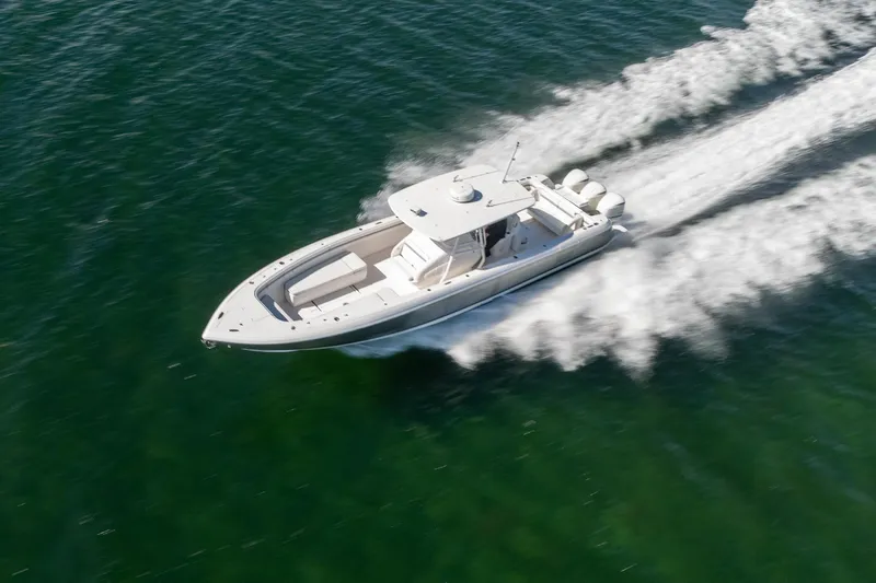  Yacht Photos Pics 2015 Intrepid 400 Center Console boat speeding on open water.