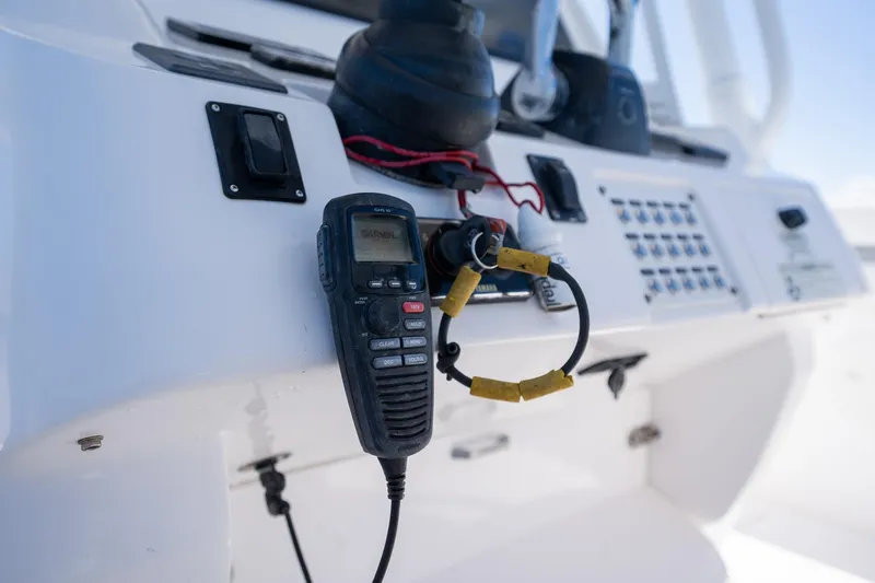  Yacht Photos Pics Control panel of a 2015 Intrepid 400 Center Console boat with marine radio.