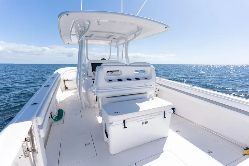  Yacht Photos Pics 2015 Intrepid 400 Center Console boat on open sea, sunny day.