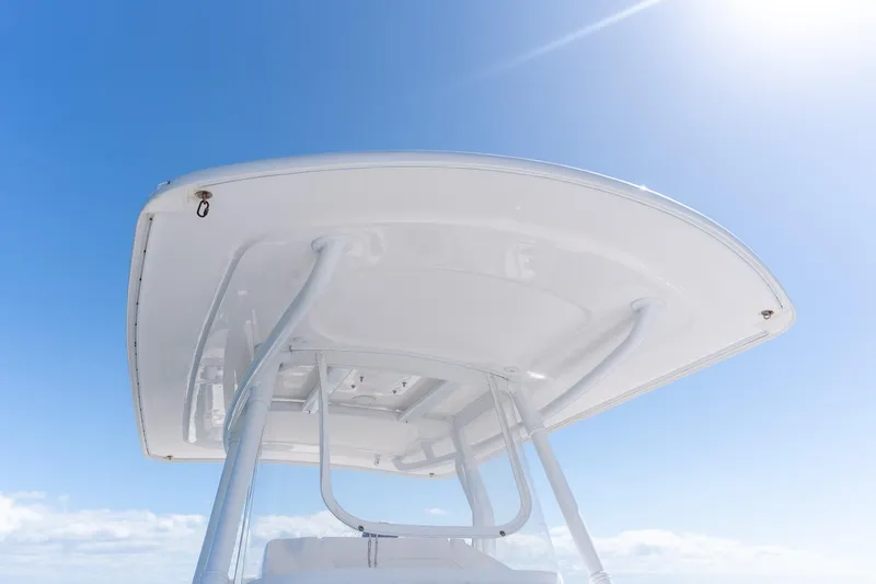  Yacht Photos Pics 2015 Intrepid 400 Center Console boat top against clear blue sky.