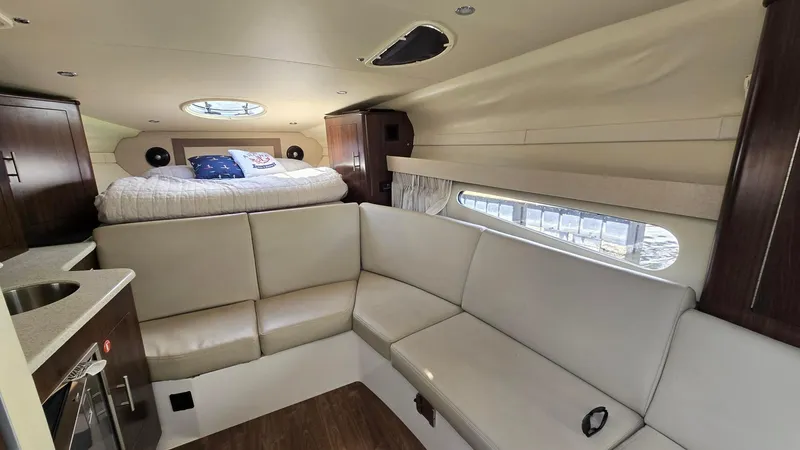  Yacht Photos Pics Interior of 2017 Regal 32 Express yacht with seating and bed.