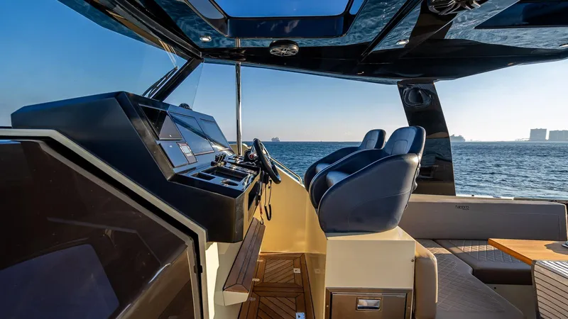  Yacht Photos Pics Luxury Fabbro F45 CABRIO 2025 yacht interior with ocean view, featuring sleek design and modern controls.