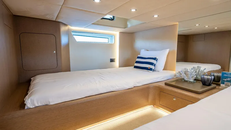  Yacht Photos Pics Luxurious cabin interior of 2025 Fabbro F45 CABRIO yacht with modern bedding.