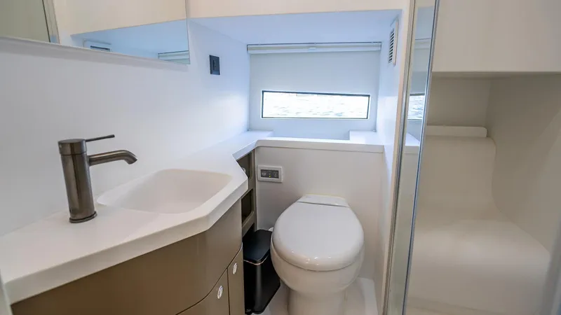  Yacht Photos Pics Modern bathroom interior in 2025 Fabbro F45 CABRIO yacht, featuring sleek design and compact layout.