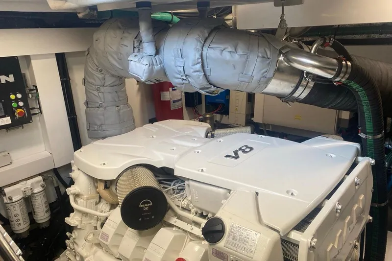 Yacht Photos Pics Engine room of 2019 Sunseeker Manhattan 66 yacht featuring a V8 engine.