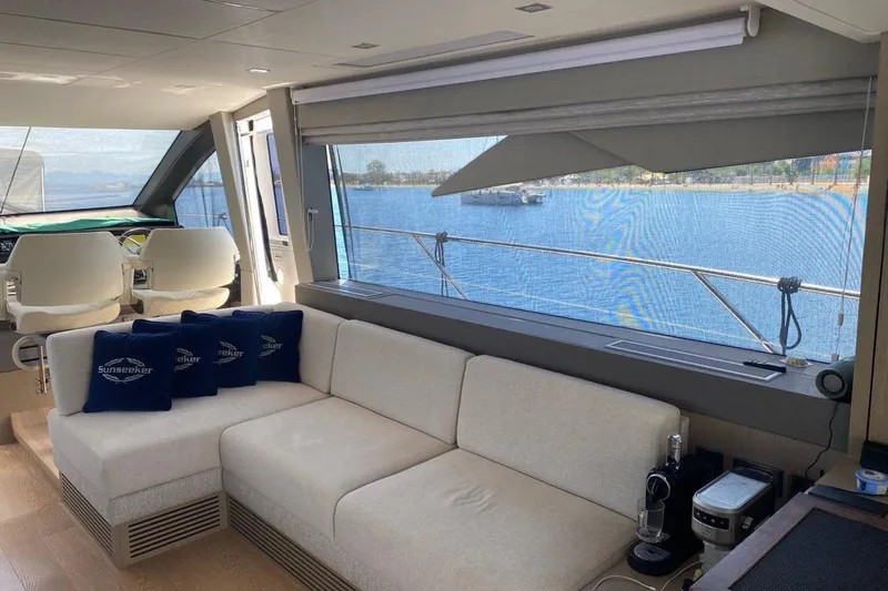  Yacht Photos Pics Luxurious interior of 2019 Sunseeker Manhattan 66 yacht with scenic ocean view.