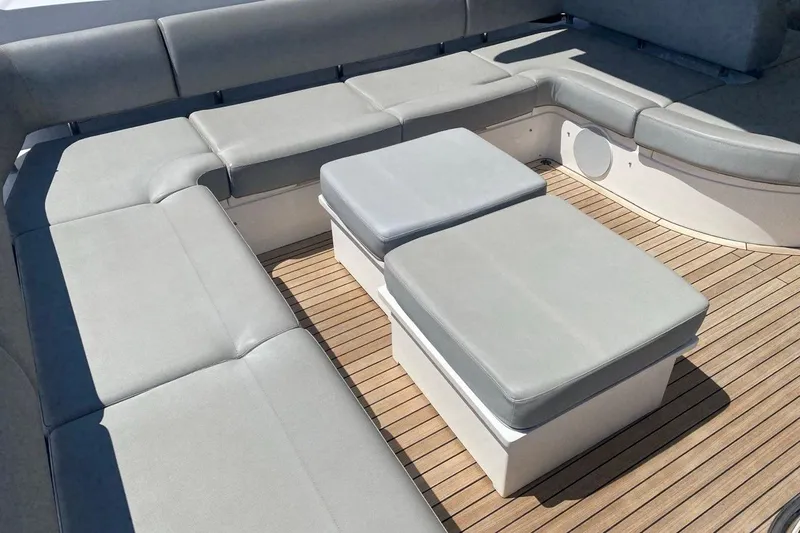  Yacht Photos Pics Luxurious seating area on 2019 Sunseeker Manhattan 66 yacht with teak flooring.