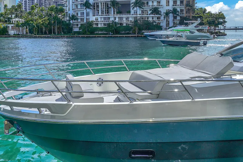  Yacht Photos Pics Azimut Verve 40 yacht, 2020 model, docked in a scenic waterfront setting.